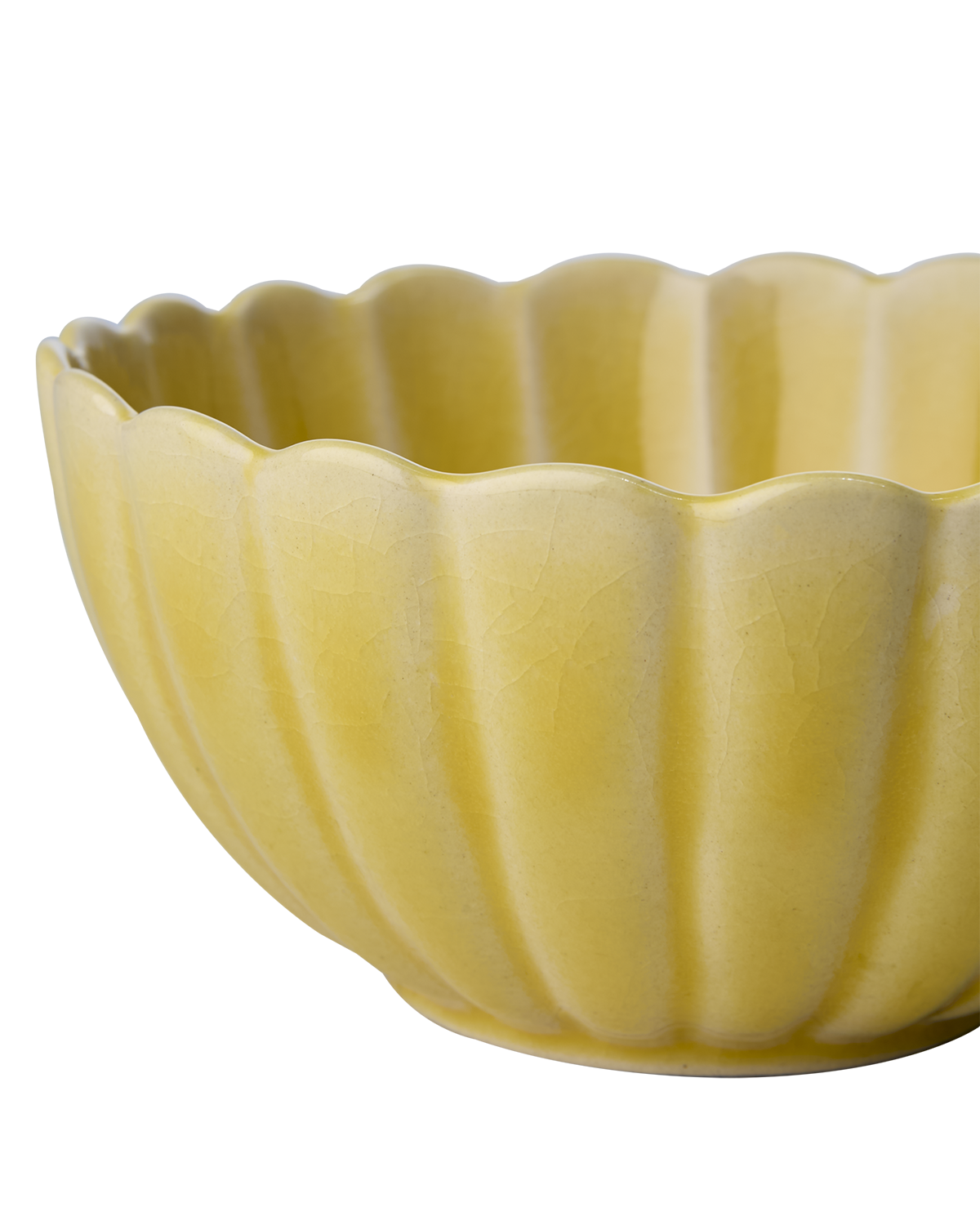 Flor Skål i gul helt tæt på så man kan se den blomsterinspirerede kant