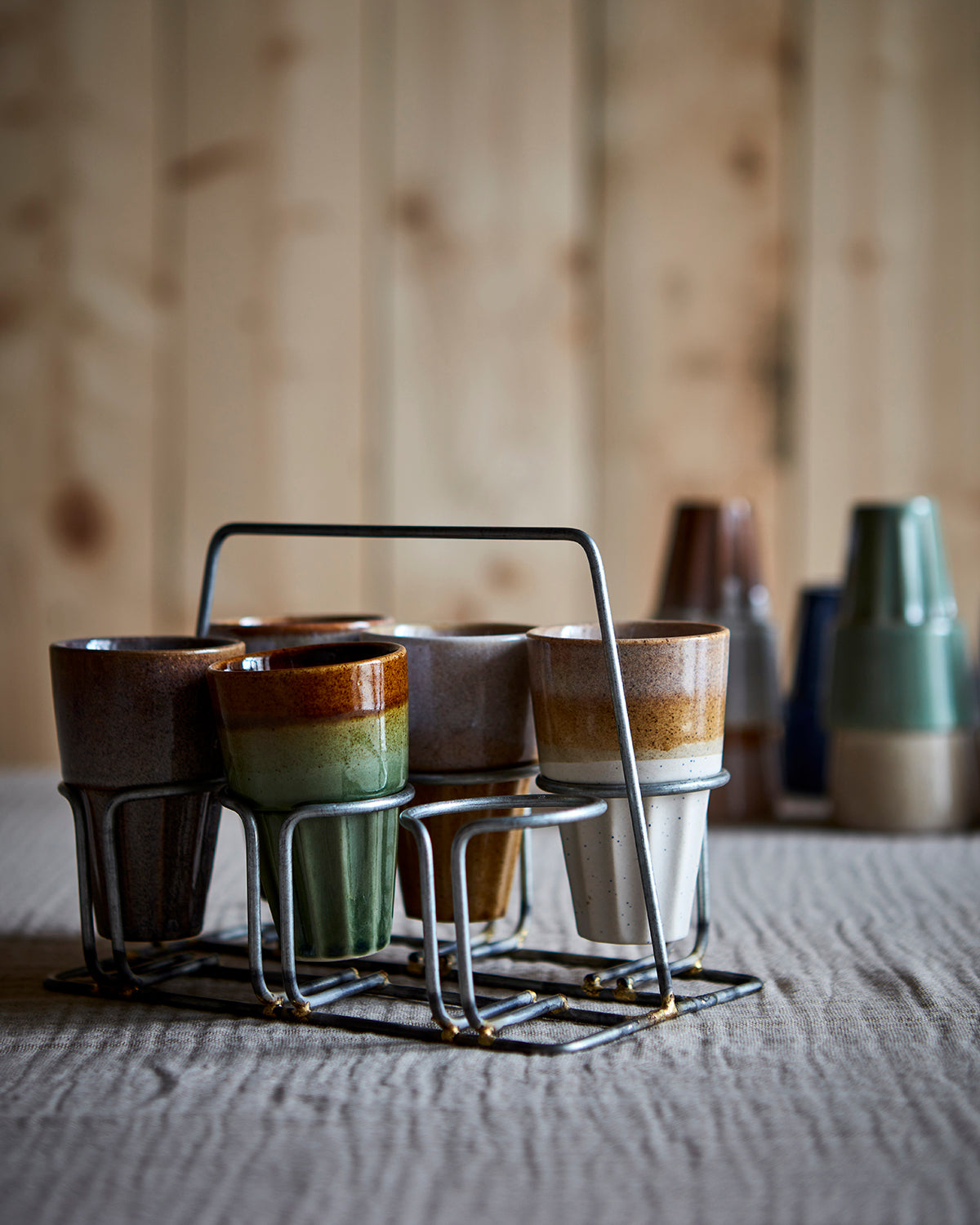 Cala kopperne i flere farver i et stativ