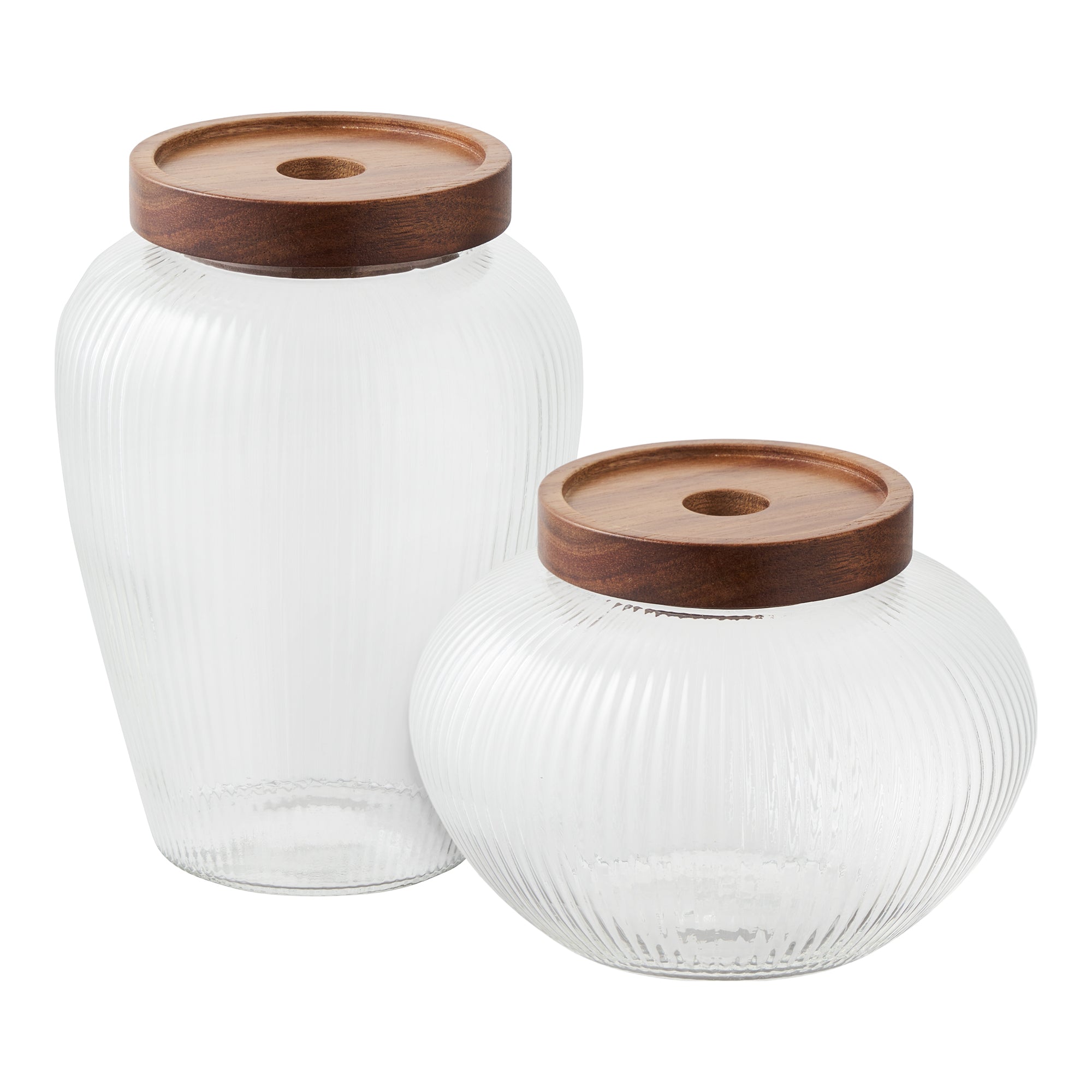 Elegant opbevaringsglas i klart riflet glas med dekorativt trælåg til køkken og opbevaring